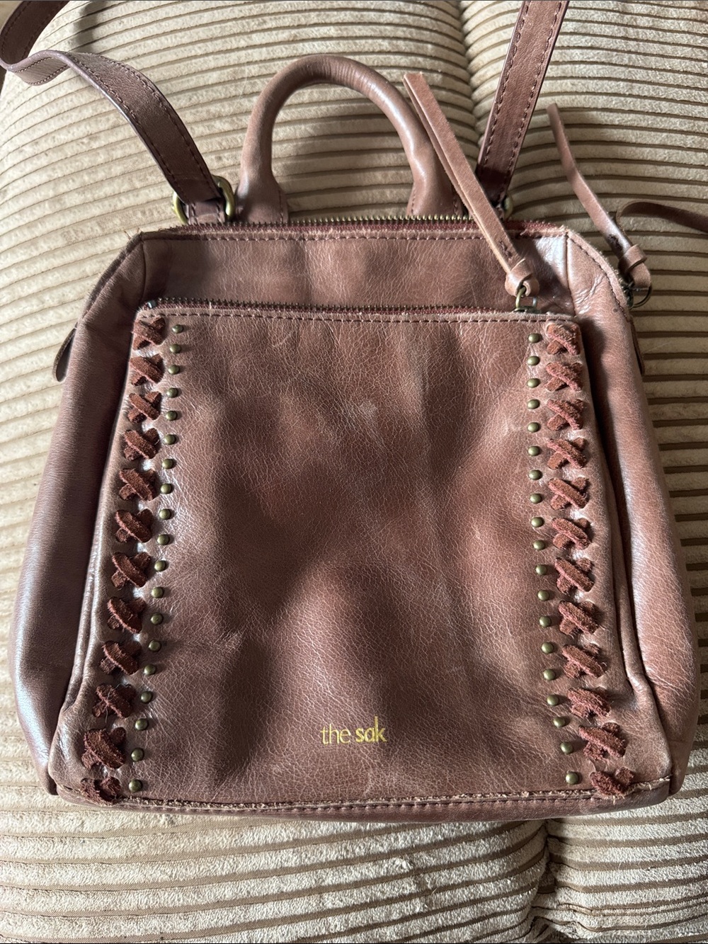 The Sak Brown Leather Backpack with Woven Side Detail